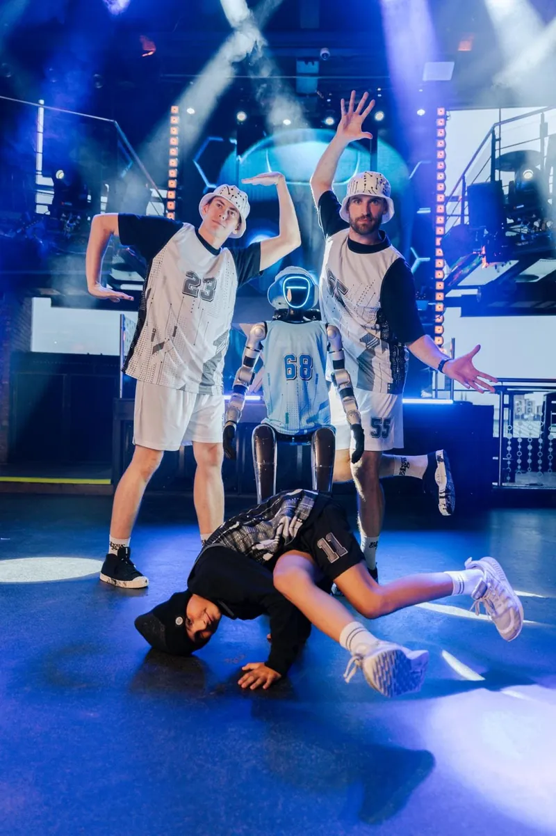 ROBOrevue dance show with humanoid robots and dancers
