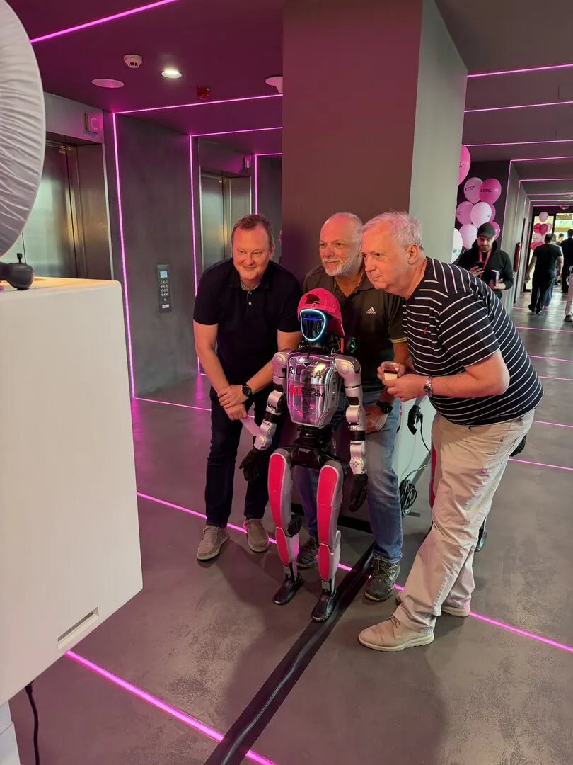 ROBOTio humanoid robot with T-Mobile conference guests